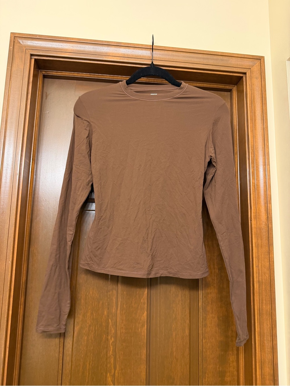 SKIMS Long Sleeve Crewneck Top in Brown